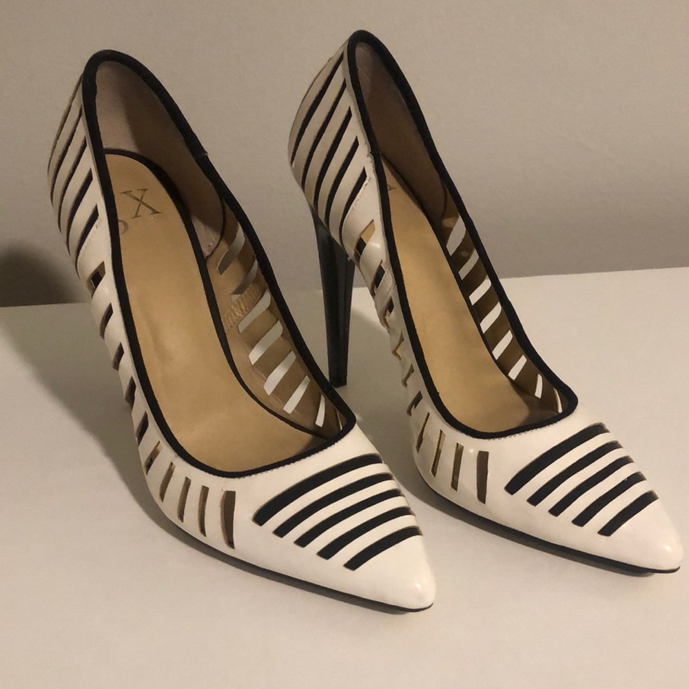 Cute white and black leather heels.